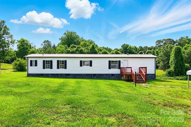 1016 S D Ave, Maiden, NC 28650 - rear view of house featuring crawl space, a lawn, and metal roof