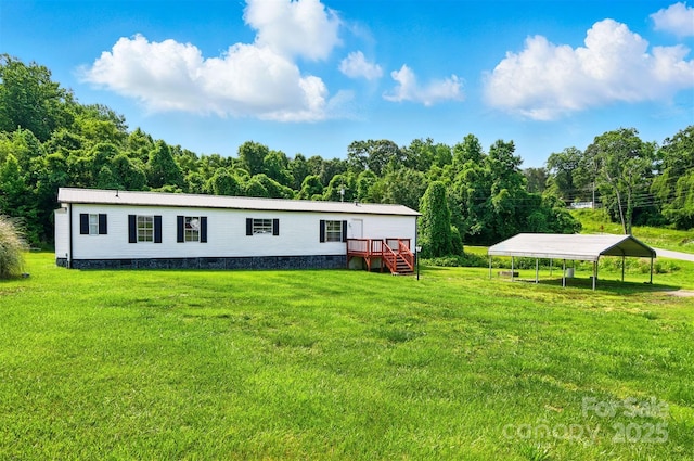 1016 S D Ave, Maiden, NC 28650 - view of front of house with a deck, a carport, a front lawn, and crawl space