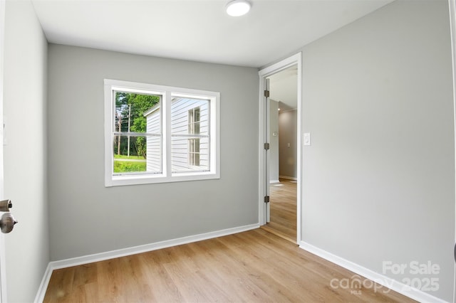 1016 S D Ave, Maiden, NC 28650 - unfurnished room featuring light wood-style floors and baseboards