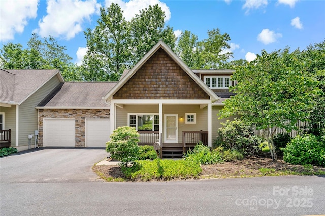 1 Teresa Way, Black Mountain, NC 28711 - view of front of home with a garage, driveway, roof with shingles, and stone siding