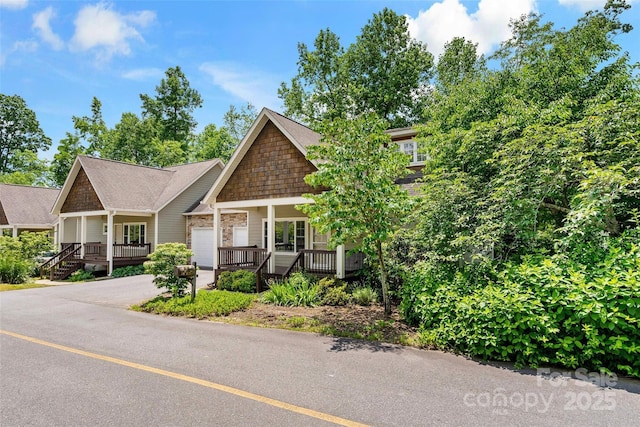 1 Teresa Way, Black Mountain, NC 28711 - view of front facade featuring a porch, an attached garage, and concrete driveway