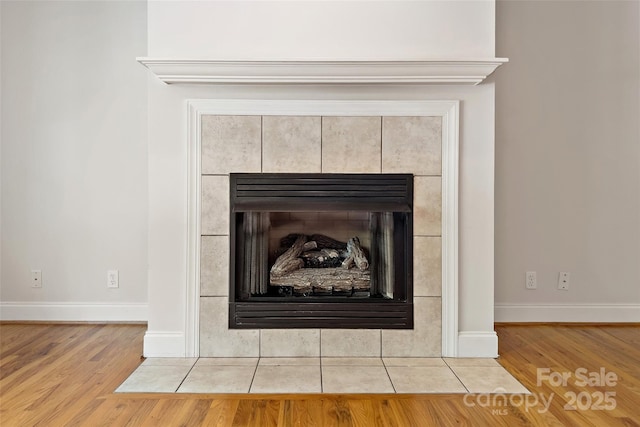 1 Teresa Way, Black Mountain, NC 28711 - detailed view of a tile fireplace, wood finished floors, and baseboards