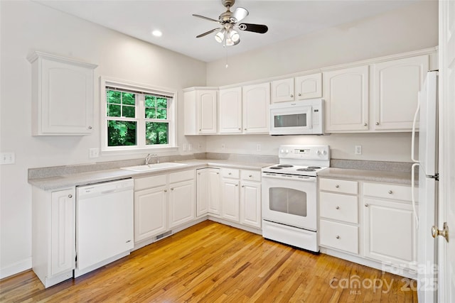 1 Teresa Way, Black Mountain, NC 28711 - kitchen with white appliances, a sink, a ceiling fan, white cabinetry, and light wood finished floors