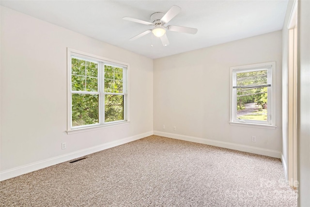 1 Teresa Way, Black Mountain, NC 28711 - spare room with healthy amount of natural light, carpet, baseboards, and a ceiling fan