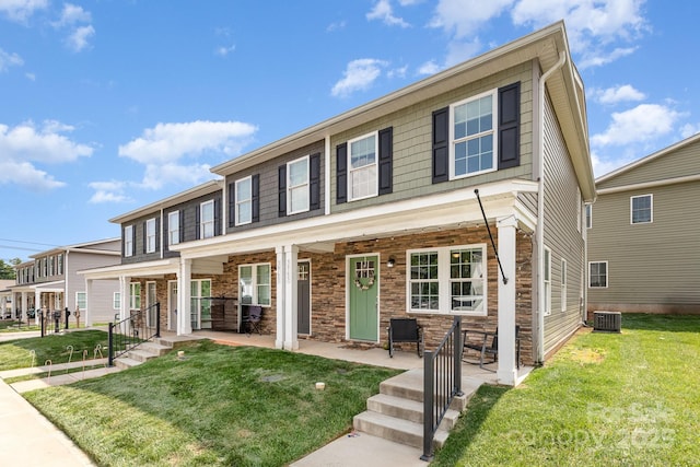 3965 Hemingway Dr, Hickory, NC 28601 - multi unit property with a porch, a front yard, stone siding, and central AC unit