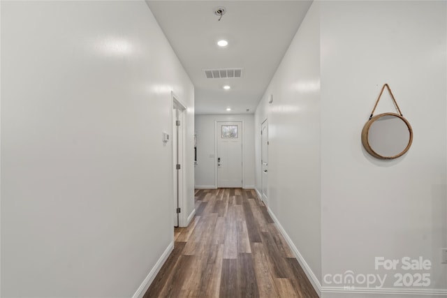2813 Ava Ave, Charlotte, NC 28208 - hall with dark wood-type flooring, baseboards, and recessed lighting