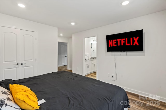 2813 Ava Ave, Charlotte, NC 28208 - bedroom featuring wood finished floors, baseboards, a closet, recessed lighting, and ensuite bathroom
