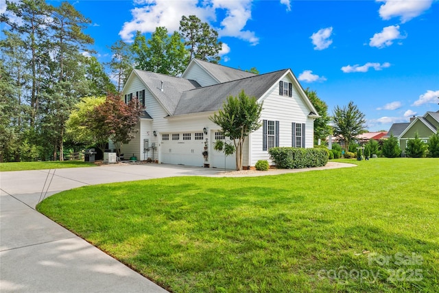 738 Rocky Hollow Trl, Clover, SC 29710 - view of side of home featuring concrete driveway, a lawn, an attached garage, and a shingled roof