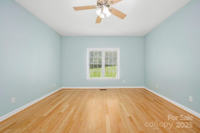 117 Chandler Dr, Mocksville, NC 27028 - unfurnished room featuring baseboards, wood finished floors, and a ceiling fan