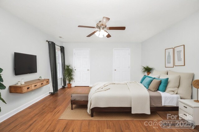 117 Chandler Dr, Mocksville, NC 27028 - bedroom with wood finished floors, baseboards, and ceiling fan