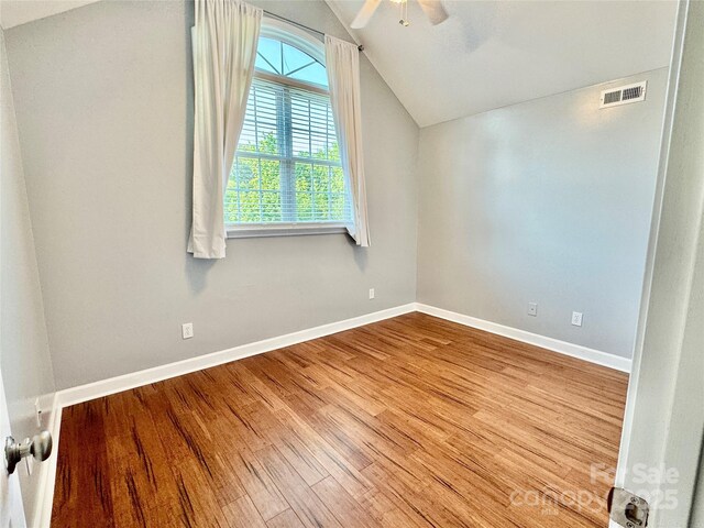 117 Chandler Dr, Mocksville, NC 27028 - additional living space with lofted ceiling, wood finished floors, baseboards, and ceiling fan