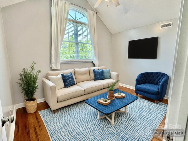 117 Chandler Dr, Mocksville, NC 27028 - living room featuring vaulted ceiling, a ceiling fan, wood finished floors, and baseboards