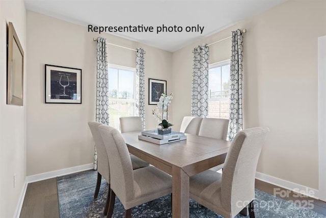 1817 Ab Moore Jr Dr Unit 3240, Indian Trail, NC 28079 - dining space with baseboards and dark wood finished floors