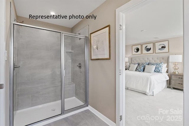 1817 Ab Moore Jr Dr Unit 3240, Indian Trail, NC 28079 - ensuite bathroom featuring baseboards and a stall shower