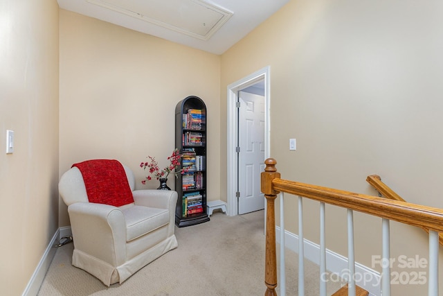 9210 Ginhouse Ln, Charlotte, NC 28277 - sitting room featuring attic access, light colored carpet, and an upstairs landing