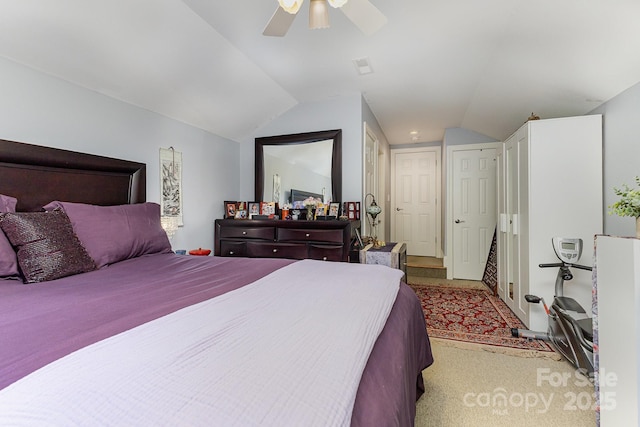 9210 Ginhouse Ln, Charlotte, NC 28277 - bedroom with lofted ceiling, light carpet, and a ceiling fan