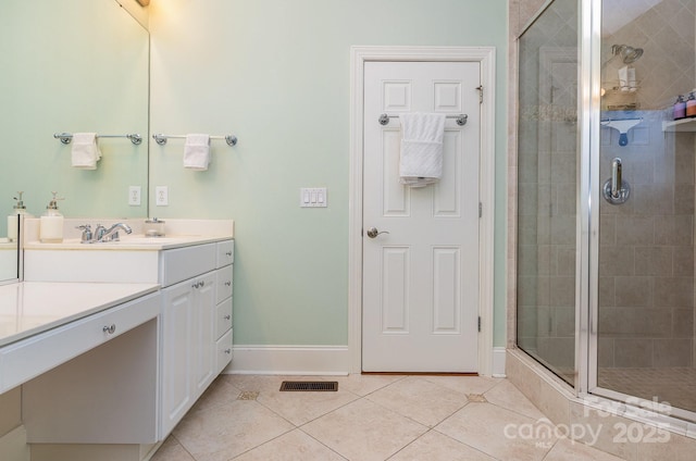 9210 Ginhouse Ln, Charlotte, NC 28277 - full bathroom featuring vanity, a stall shower, and tile patterned floors