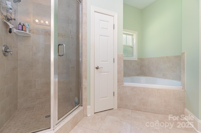 9210 Ginhouse Ln, Charlotte, NC 28277 - full bathroom featuring a shower stall, tile patterned floors, and a bath