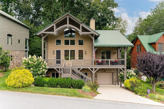 649 Panoramic Loop, Maggie Valley, NC 28751 - view of front of house featuring stone siding, stairway, a chimney, concrete driveway, and a porch