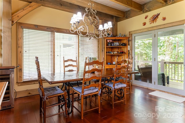 649 Panoramic Loop, Maggie Valley, NC 28751 - dining area featuring a chandelier, hardwood / wood-style floors, healthy amount of natural light, and wooden ceiling with exposed beams