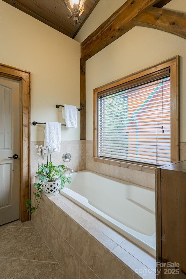 649 Panoramic Loop, Maggie Valley, NC 28751 - full bathroom featuring vaulted ceiling, tile patterned flooring, and a bath