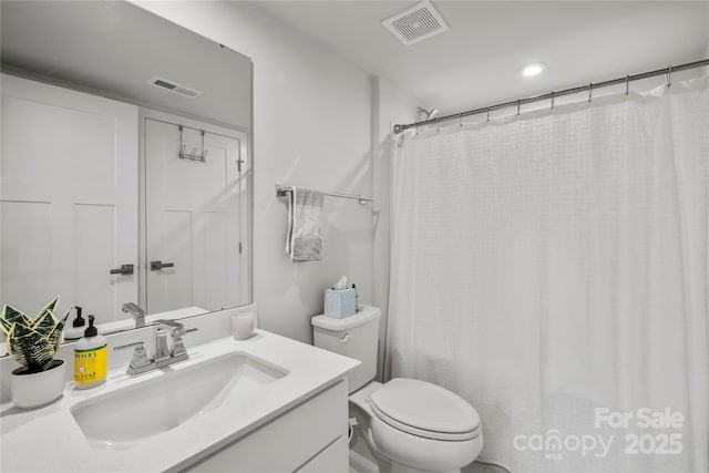 120 August Ln, Stallings, NC 28104 - bathroom with vanity, toilet, and recessed lighting