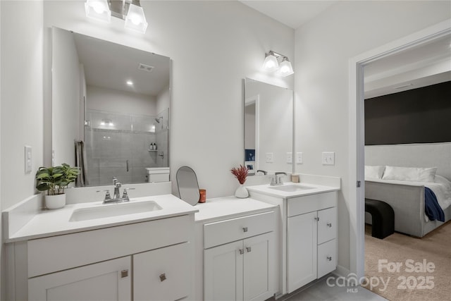 120 August Ln, Stallings, NC 28104 - full bathroom featuring a shower stall, two vanities, and connected bathroom