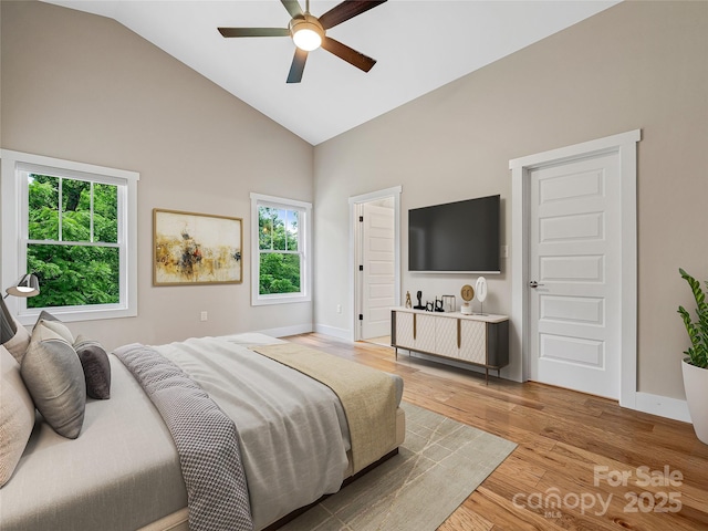 108 Le-An-Hurst Rd, Asheville, NC 28803 - bedroom featuring high vaulted ceiling, multiple windows, light wood-style floors, and ceiling fan
