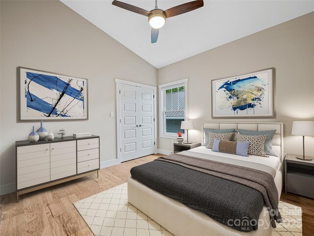 108 Le-An-Hurst Rd, Asheville, NC 28803 - bedroom featuring wood finished floors, vaulted ceiling, and ceiling fan