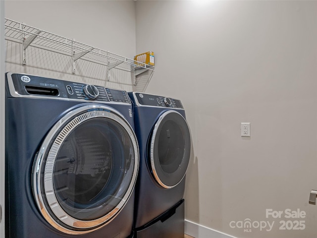 108 Le-An-Hurst Rd, Asheville, NC 28803 - laundry area featuring washer and dryer and baseboards