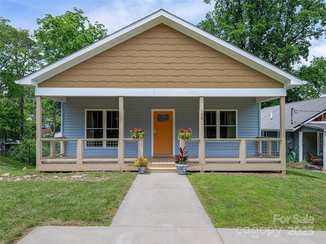 108 Le-An-Hurst Rd, Asheville, NC 28803 - view of front of property with a porch and a front lawn