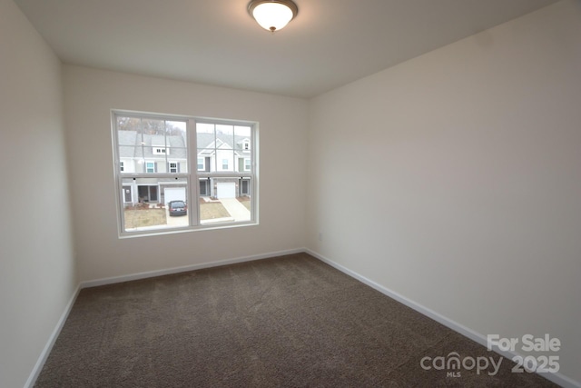 222 Harpers Run Ln, Matthews, NC 28104 - empty room with dark carpet and baseboards