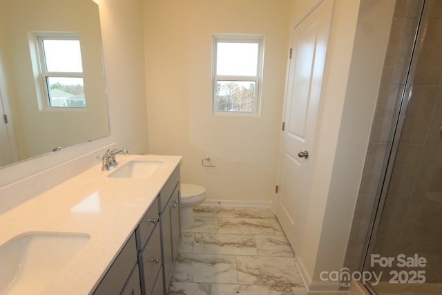 222 Harpers Run Ln, Matthews, NC 28104 - bathroom featuring double vanity, marble finish flooring, healthy amount of natural light, and tiled shower