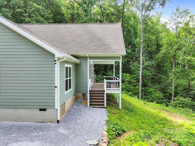 771 Sally Gap Rd, Old Fort, NC 28762 - view of home's exterior featuring crawl space, roof with shingles, and a view of trees
