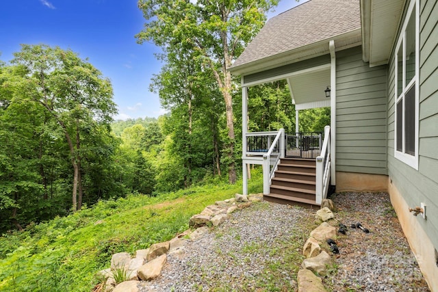 771 Sally Gap Rd, Old Fort, NC 28762 - view of yard featuring a view of trees, a wooden deck, and stairs