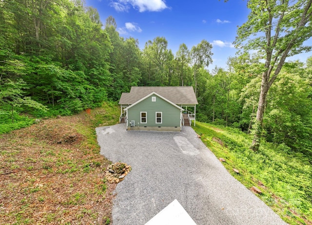 771 Sally Gap Rd, Old Fort, NC 28762 - view of front facade featuring gravel driveway, a view of trees, and crawl space