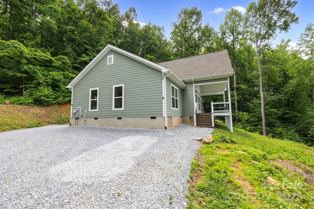 771 Sally Gap Rd, Old Fort, NC 28762 - view of front facade with crawl space, gravel driveway, a porch, and stairs