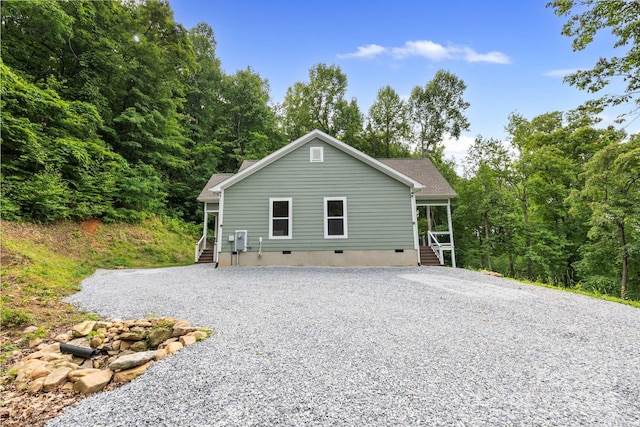 771 Sally Gap Rd, Old Fort, NC 28762 - rear view of property with crawl space and gravel driveway