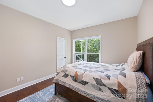 771 Sally Gap Rd, Old Fort, NC 28762 - bedroom featuring wood finished floors and baseboards