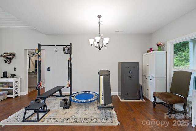 771 Sally Gap Rd, Old Fort, NC 28762 - exercise area featuring a chandelier and dark wood-style flooring