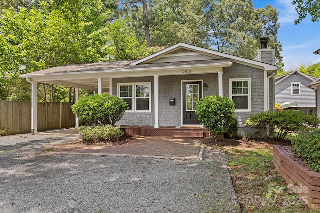 2813 Hilliard Dr, Charlotte, NC 28205 - bungalow-style home with a chimney, covered porch, and a shingled roof
