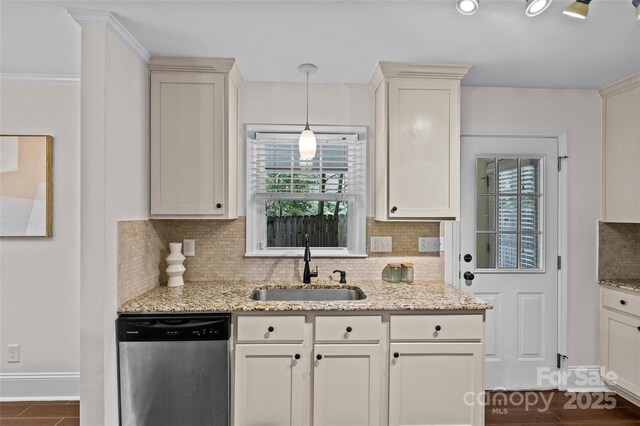 2813 Hilliard Dr, Charlotte, NC 28205 - kitchen with stainless steel dishwasher, backsplash, and plenty of natural light
