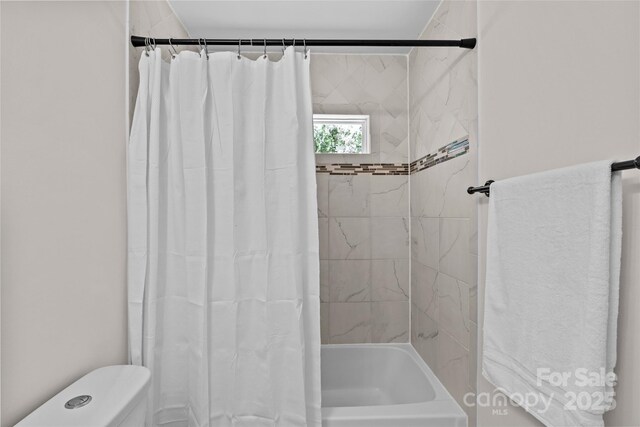 2813 Hilliard Dr, Charlotte, NC 28205 - bathroom with toilet and shower / bath combination with curtain