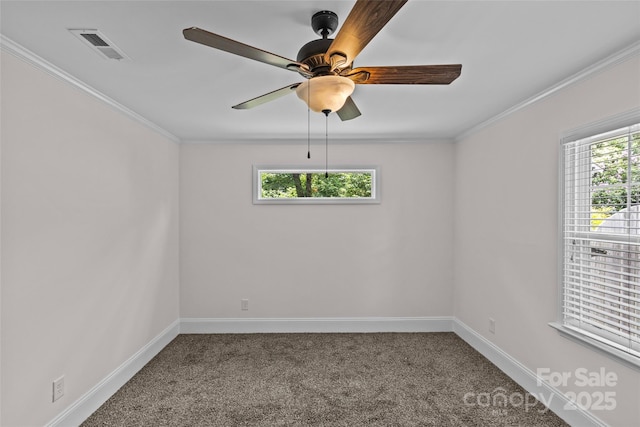 2813 Hilliard Dr, Charlotte, NC 28205 - unfurnished room with carpet, plenty of natural light, a ceiling fan, and ornamental molding