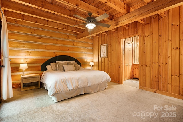 2255 Wolf Laurel Rd, Mars Hill, NC 28754 - bedroom featuring wood ceiling with exposed beams, carpet flooring, and wood walls