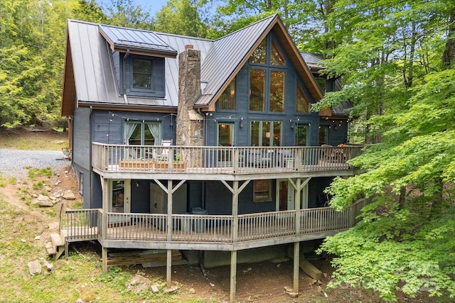 2255 Wolf Laurel Rd, Mars Hill, NC 28754 - rear view of property with a standing seam roof, a wooden deck, and metal roof