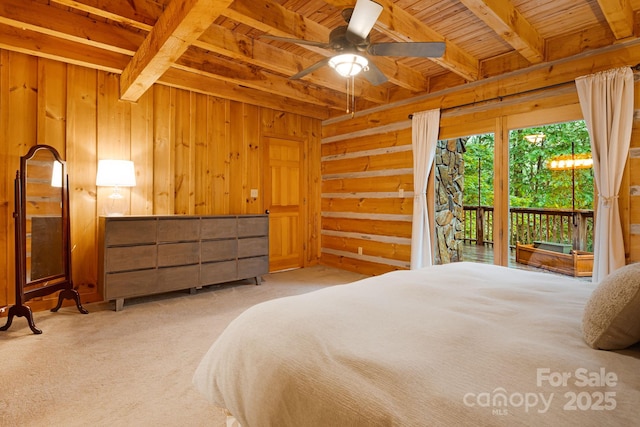 2255 Wolf Laurel Rd, Mars Hill, NC 28754 - unfurnished bedroom featuring access to exterior, wood ceiling with exposed beams, wooden walls, and carpet flooring