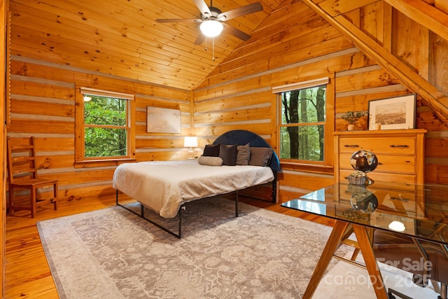 2255 Wolf Laurel Rd, Mars Hill, NC 28754 - bedroom with vaulted ceiling, multiple windows, wood ceiling, wood-type flooring, and wood walls