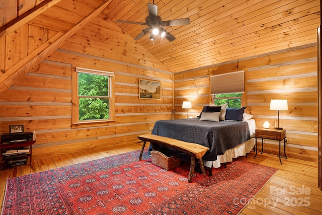 2255 Wolf Laurel Rd, Mars Hill, NC 28754 - bedroom featuring multiple windows, hardwood / wood-style flooring, lofted ceiling, wooden walls, and wooden ceiling
