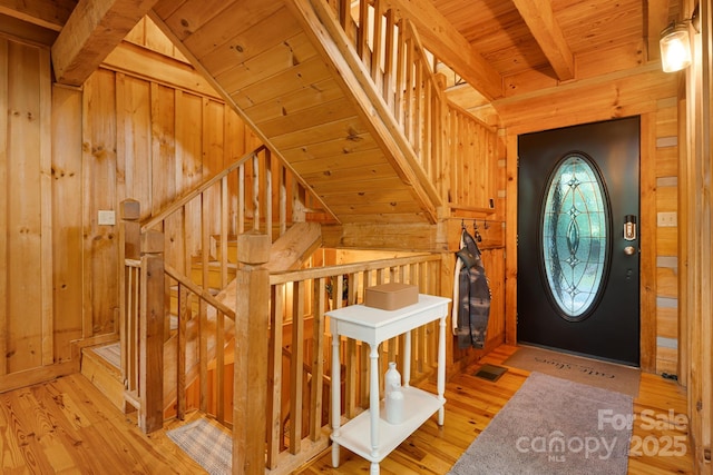 2255 Wolf Laurel Rd, Mars Hill, NC 28754 - foyer with wood walls, wooden ceiling, and light wood-style floors
